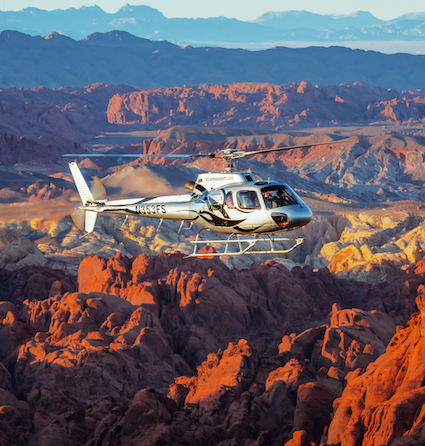 Fly over Las Vegas as your helicopter heads across the Mojave Desert towards the uniquely beautiful Valley of Fire State Park.